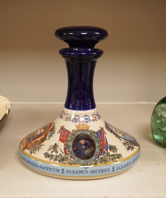 Wade 'Purser's Navy Rum Decanter' and two Captain Morgan rum boat ashtrays, decanter 24cm high